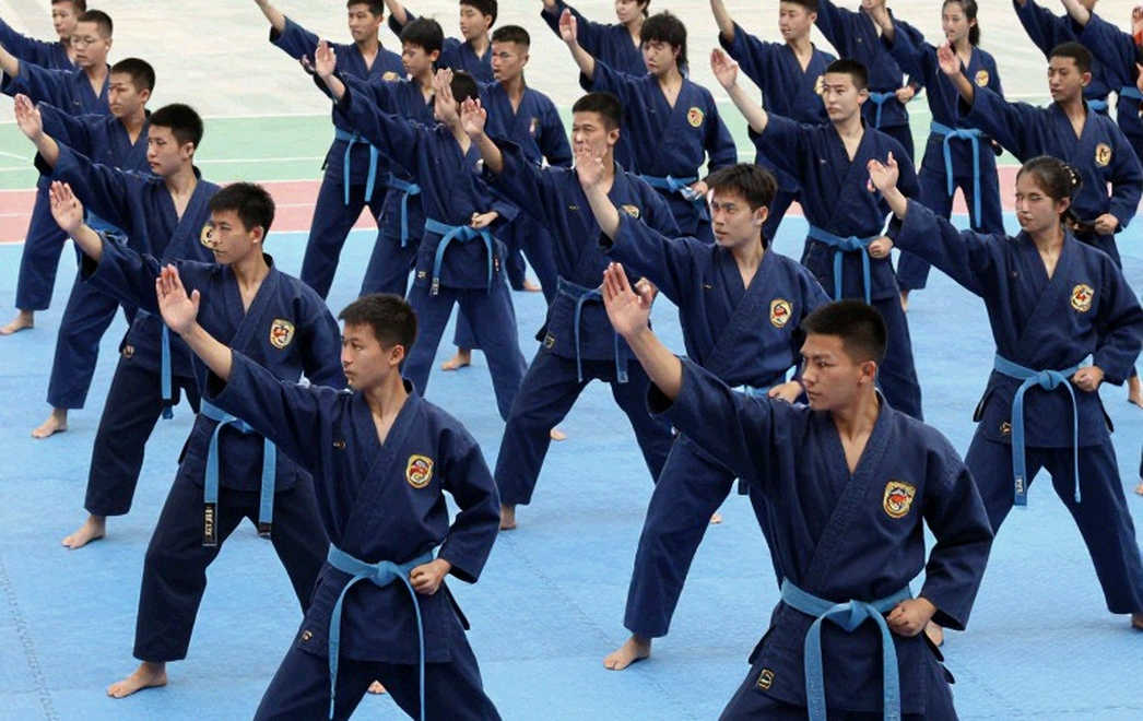 Đinh Văn Tâm và bài toán 56kg: Khi niềm tin đối đầu dữ liệu ở chung kết sanda ASIAD 20
